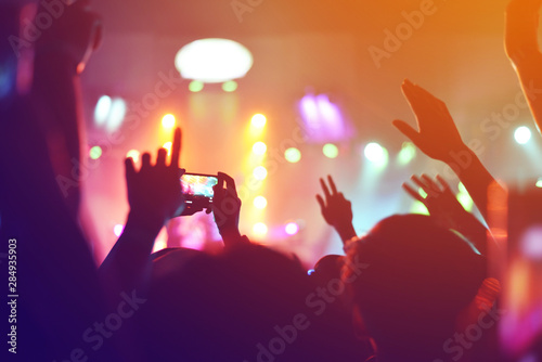 Fototapeta Naklejka Na Ścianę i Meble -  silhouettes of  , Fun concert party rock disco light background.