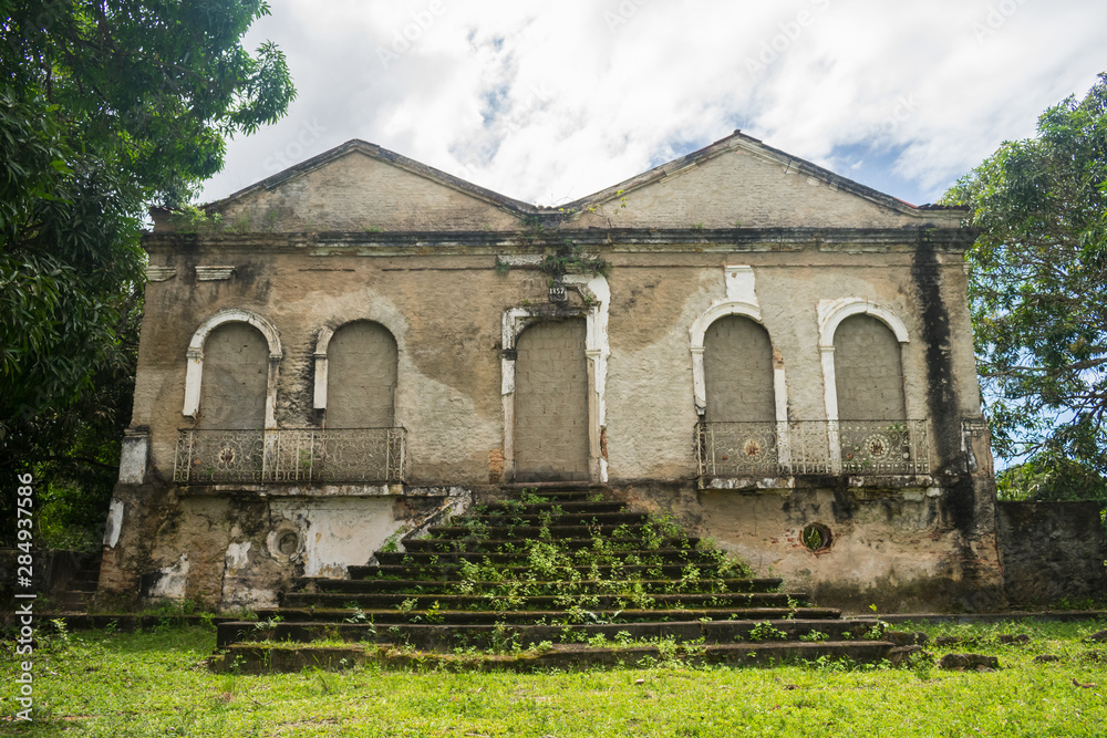 Main House of Engenho Sao Joao on Itamaraca Island, Brazil - totally abandoned and with cemented windows and doors