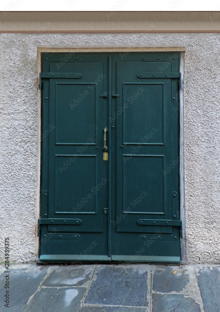Closed green wooden door