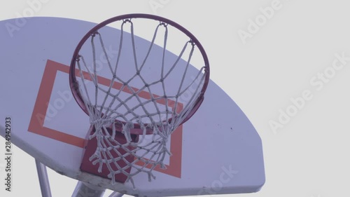 Basketball hoop on a cloudy day