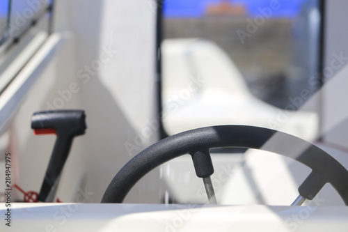 Motor boat steering wheel with throttle control © VP