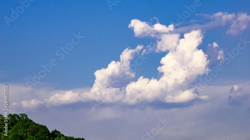 A high rain cloud in the distance (Cumulonimbus)
