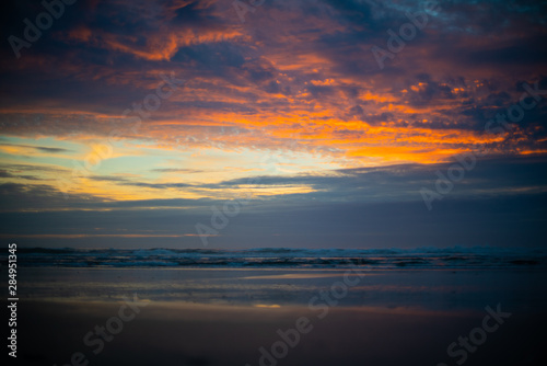 sunset over the ocean © Roman
