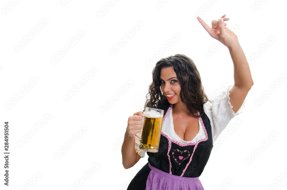 Bavarian style waitress holding Beer mug and doing ordering gesture Bavarian style waitress holding Beer mug and doing ordering gesture