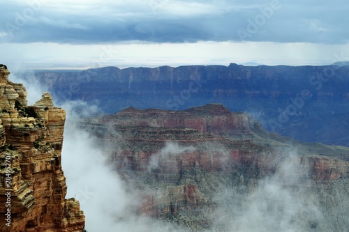 Fog Sets in at North Rim of Grand Canyon's Gorge Highlighting Formations