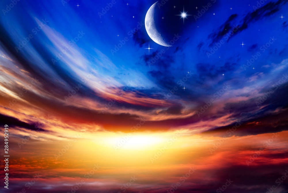 Beautiful dark fluffy cloudy sky with sun rays . Crescent moon with beautiful sunset background . Generous Ramadan . New moon. Prayer time.