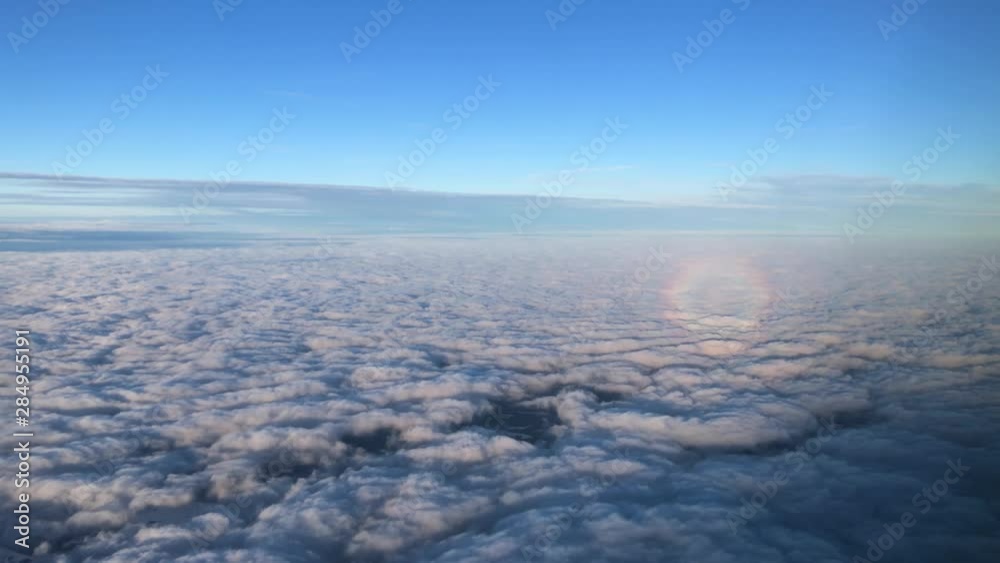 Heavenly clouds and blue sky, view from airplane a cispy clear day Heavenly clouds and blue sky, view from airplane a cispy clear day