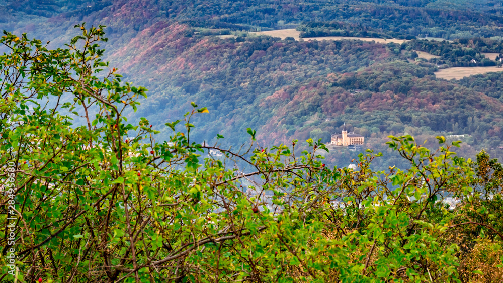 Castle Větrtuše - Czech Republic. A small castle at the distant hill, shrouded by the smog from the city Ústí nad Labem in the valley. Castle Větrtuše - Czech Republic. A small castle at the distant hill, shrouded by the smog from the city Ústí nad Labem in the valley.