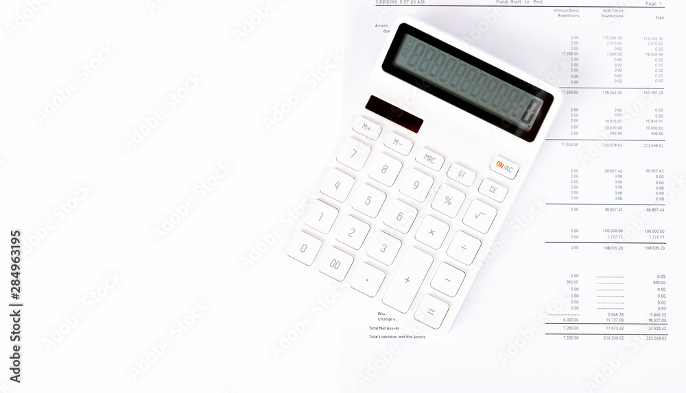 Business startup analysis summary report and using a calculator to calculate the numbers. Financial concept Business startup analysis summary report and using a calculator to calculate the numbers. Financial concept
