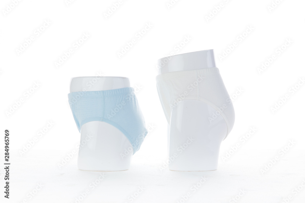 Exquisite men's underwear is displayed on the counter of the store. Beautiful pink blue and white. Choose pure cotton underwear for health. Exquisite men's underwear is displayed on the counter of the store. Beautiful pink blue and white. Choose pure cotton underwear for health.