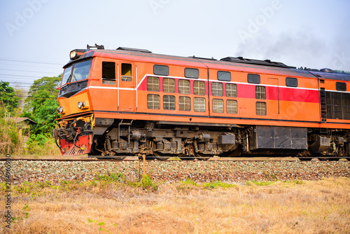 Old Thai-style trains that can still pick-up passengers on the train tracks
