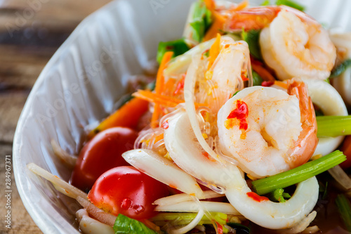 Shrimp salad dish with tomatoes, onions, coriander Delicious