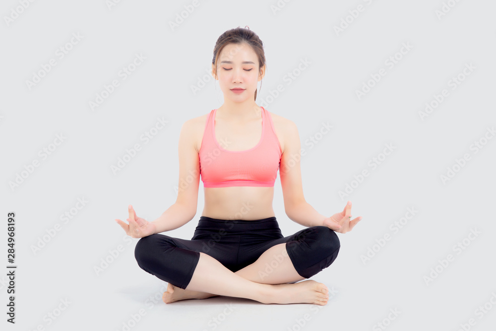 Beautiful portrait young asian woman sitting yoga, asia girl health care with workout fitness relaxing with active exercise isolated on white background, healthy and wellbeing concept. Beautiful portrait young asian woman sitting yoga, asia girl health care with workout fitness relaxing with active exercise isolated on white background, healthy and wellbeing concept.
