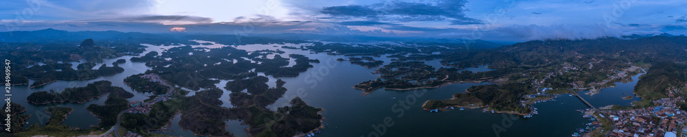 Panoramic View of the Stone, the Guatapé Peñol and the Slopes of the Small Hills that Surround it that look like Islands. Panoramic View of the Stone, the Guatapé Peñol and the Slopes of the Small Hills that Surround it that look like Islands.
