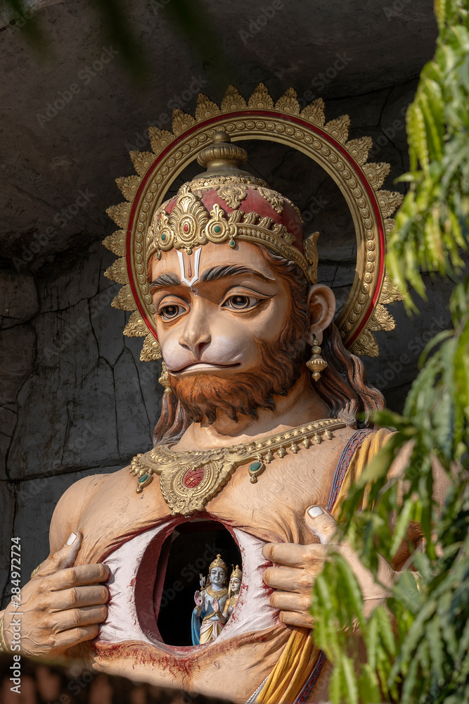 Fototapeta premium Hanuman statue, Hindu idol near Ganges River, Rishikesh, India. Sacred places for pilgrims