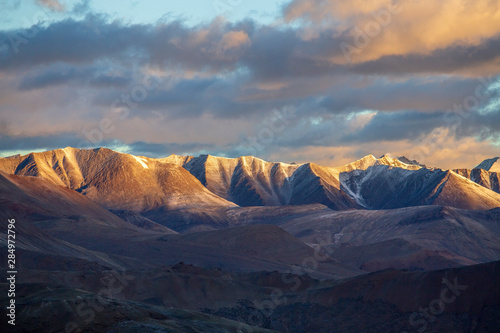 Himalayan mountain landscape along Leh to Manali highway during sunrise. Rocky mountains in Indian Himalayas, India