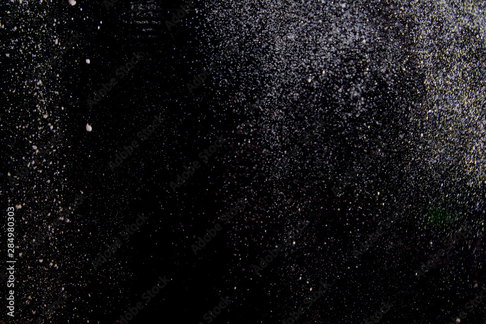 Abstract dust explosion on a black background Abstract dust explosion on a black background