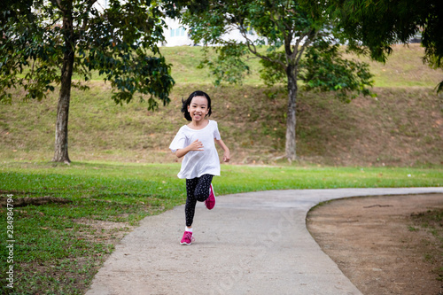 Asian Little Chinese Girl running happily