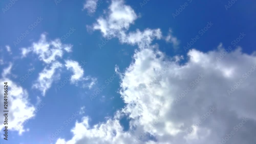 beautiful clouds floating in the sky quickly fastly the lights of a sun beautiful clouds floating in the sky quickly fastly the lights of a sun