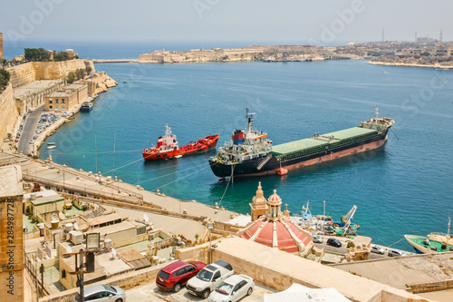 The cargo ship Fort Ricasoli in Kalkara in the Grand harbour in Valletta, Malta. Summer photo