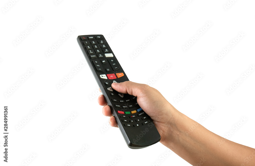 Close-up hand holding remote control isolated on white background. Close-up hand holding remote control isolated on white background.