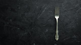 Old fork Cutlery. Top view. Free space for your text.