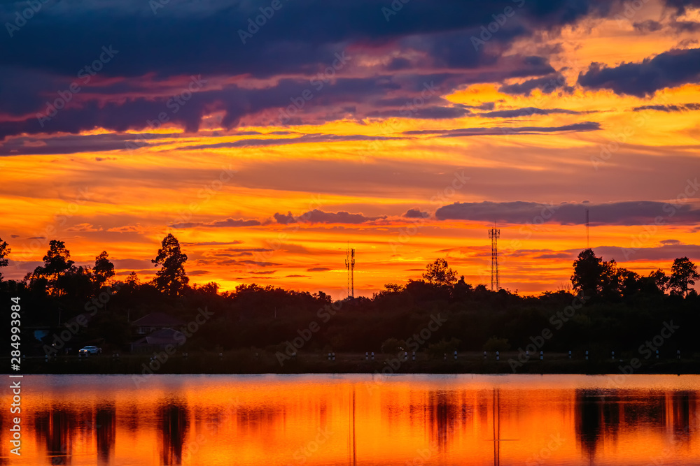 Fototapeta premium Sunset with reflection on the lake