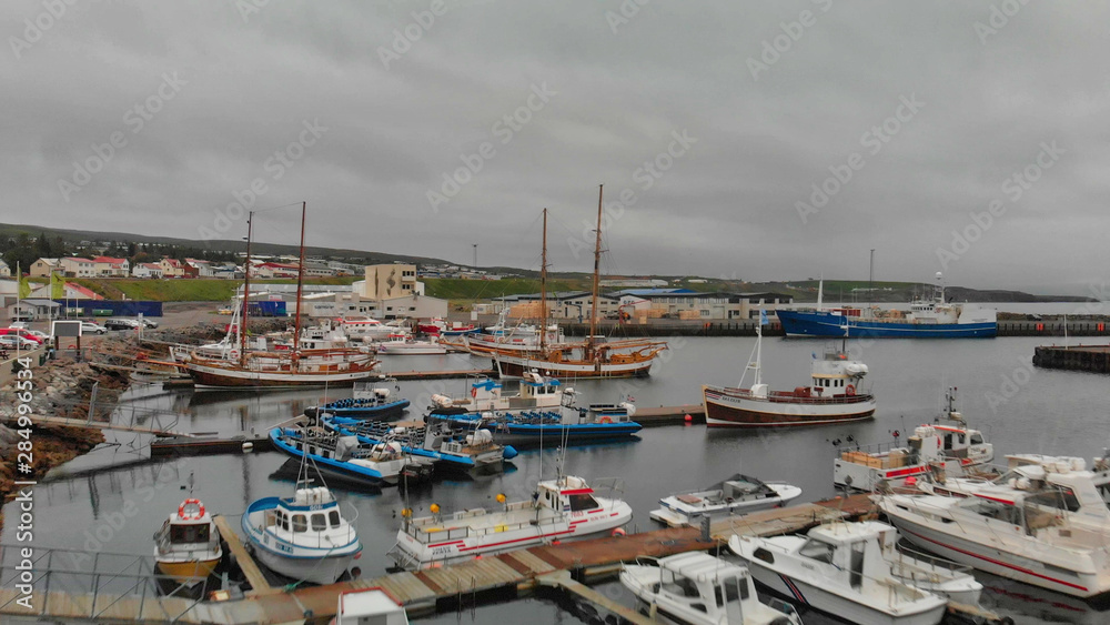 Aerial view of Husavik port in Northern Iceland, the city is famous for whales tours Aerial view of Husavik port in Northern Iceland, the city is famous for whales tours