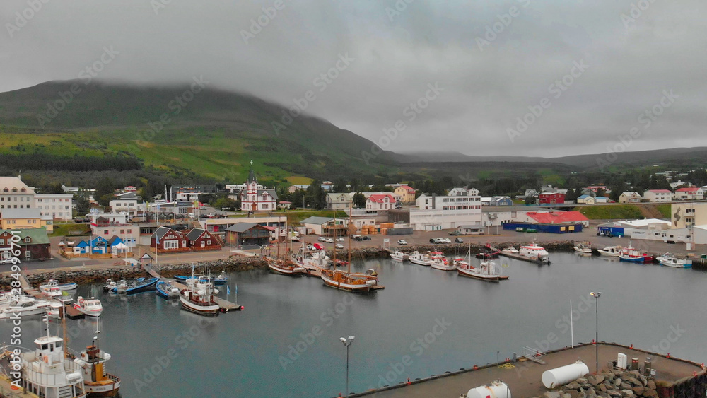 Aerial view of Husavik port in Northern Iceland, the city is famous for whales tours