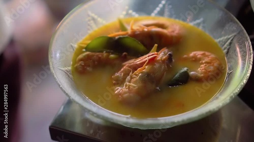 Finish dish of River prawn spicy soup. Tom Yam Goong. Traditional Thailand food. sweet blurry light look.