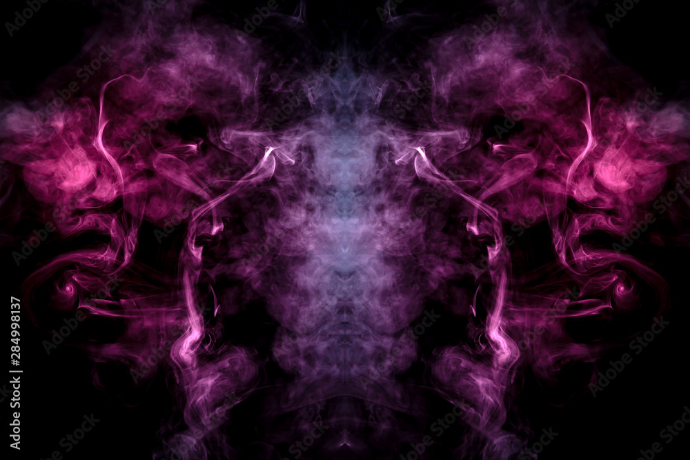 Smoke of different blue, red and pink colors in form of horror in the ...