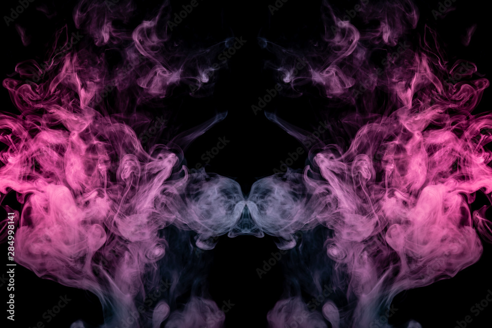Smoke of different blue, red and pink colors in form of horror in the shape of the head, face and eye with wings on a black isolated background. Soul and ghost in mystical symbol. Print for clothes. Smoke of different blue, red and pink colors in form of horror in the shape of the head, face and eye with wings on a black isolated background. Soul and ghost in mystical symbol. Print for clothes.