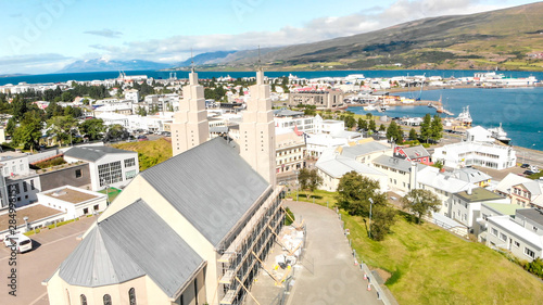 Schilderij op canvas Aerial view of Akureyri town in Iceland on a sunny summer afternoon