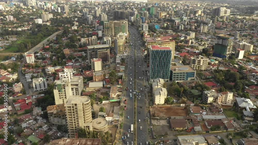 Tilted drone shot flying over traffic driving through busy main street in central Addis Ababa, Ethiopia's capital city Tilted drone shot flying over traffic driving through busy main street in central Addis Ababa, Ethiopia's capital city