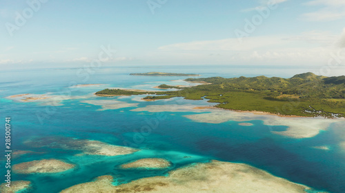 Seascape  Tropical Islands with beaches and azure coral reef water from above. Bucas grande  Philippines. Summer and travel vacation concept.