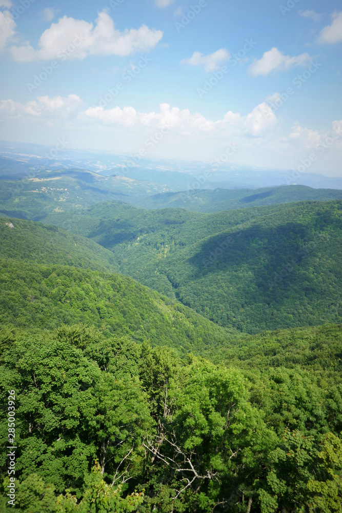 Beautiful green mountain landscape with trees in the region of Balkan mountains , Bulgaria Beautiful green mountain landscape with trees in the region of Balkan mountains , Bulgaria