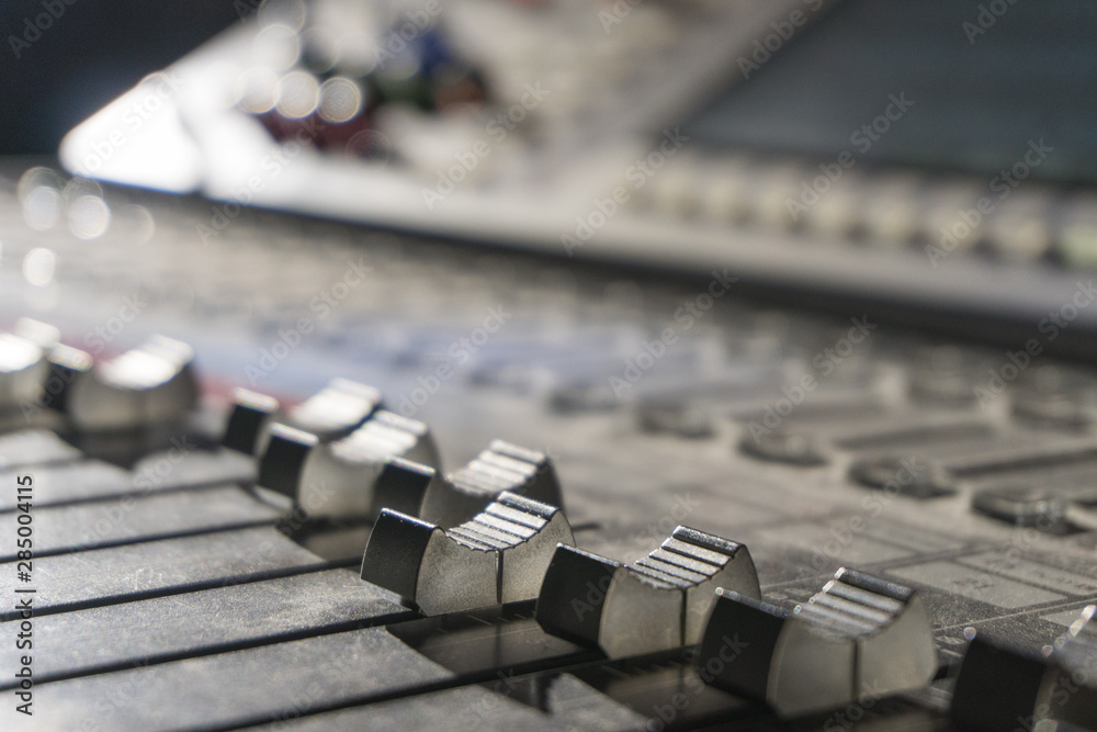 Obraz premium Close-up of mixing console, music equalizer in sound recording Studio