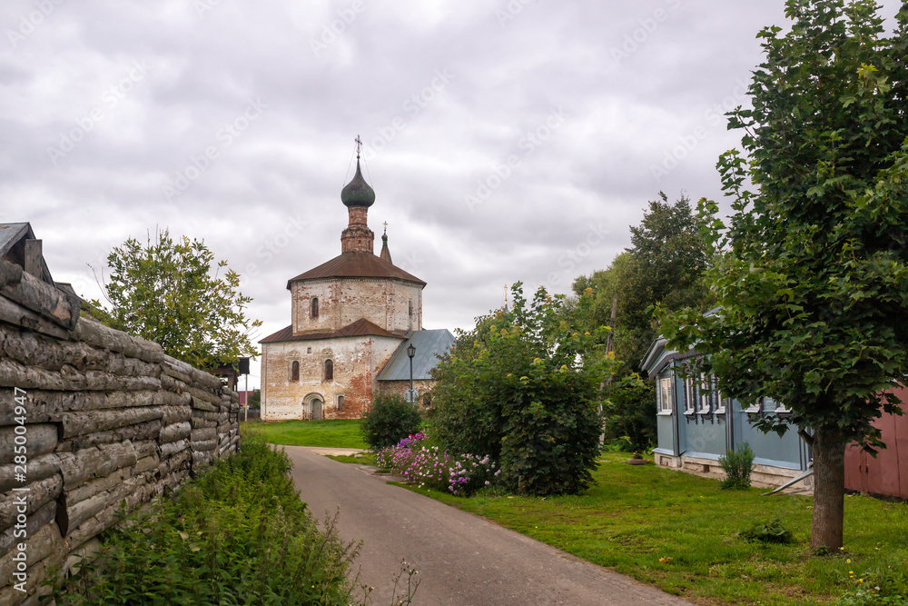 Rural summer landscape with old church
