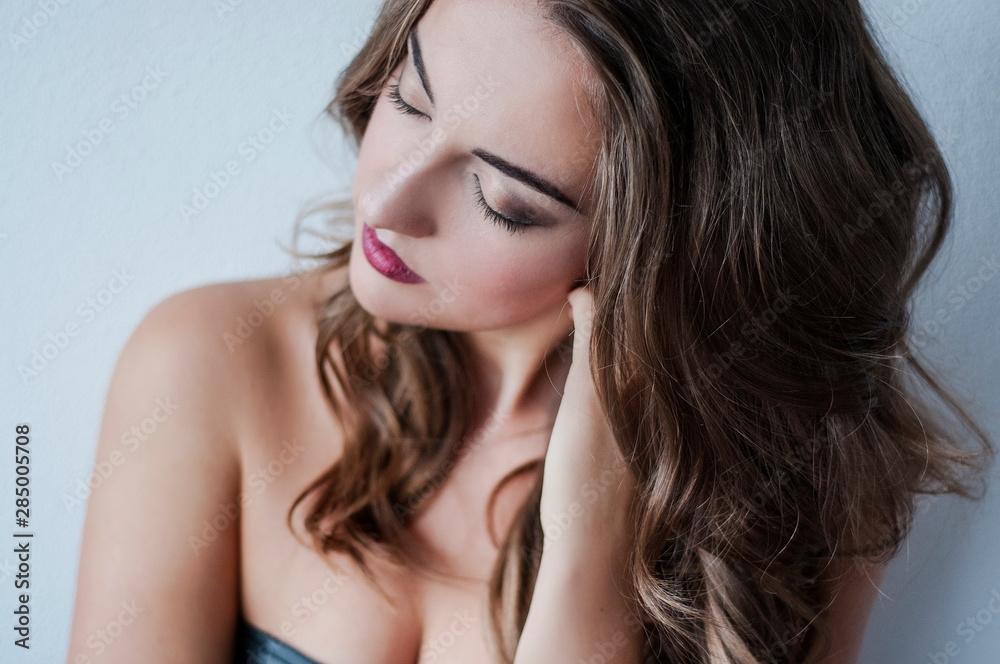 Face of a beautiful young girl with a clean fresh face close up.Brunette women with green eyses,red lips. Face of a beautiful young girl with a clean fresh face close up.Brunette women with green eyses,red lips.