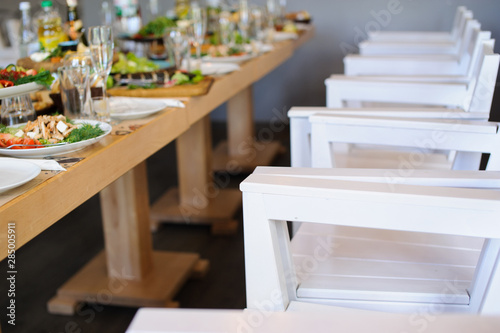 Beautiful served food on plates in restaurant