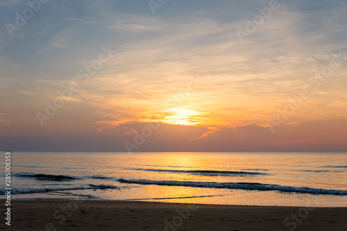 Sunrise on the sea beach © songdech17