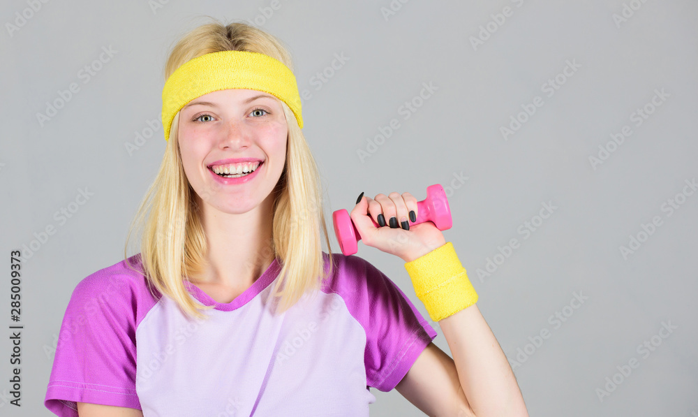 Woman fitness coach exercising with dumbbell. Woman workout in gym with sport equipment. Workout result. Find personal trainer. Workout sport and dieting. Easy biceps exercise. Workout with dumbbell Woman fitness coach exercising with dumbbell. Woman workout in gym with sport equipment. Workout result. Find personal trainer. Workout sport and dieting. Easy biceps exercise. Workout with dumbbell