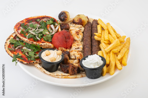 Fotografi Lebanese Mixed Grill plate isolated on white.