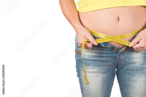 middle-aged woman suffering from obesity , the concept of overweight in the age