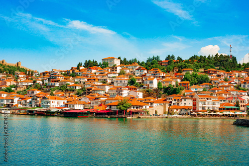 North macedonia. Ohrid. Different buildings and houses with red roofs on hill. View from lake