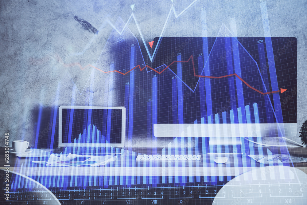 Double exposure of graph and financial info and work space with computer background. Concept of international online trading. Double exposure of graph and financial info and work space with computer background. Concept of international online trading.