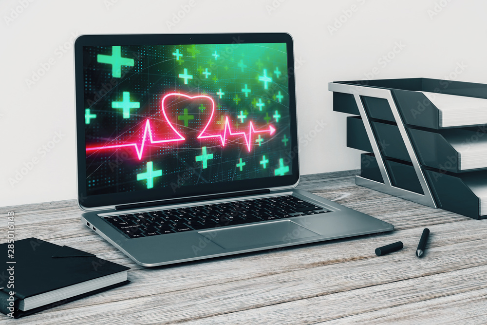 Laptop closeup with human heart drawing on computer screen. Education concept. 3d rendering. Laptop closeup with human heart drawing on computer screen. Education concept. 3d rendering.