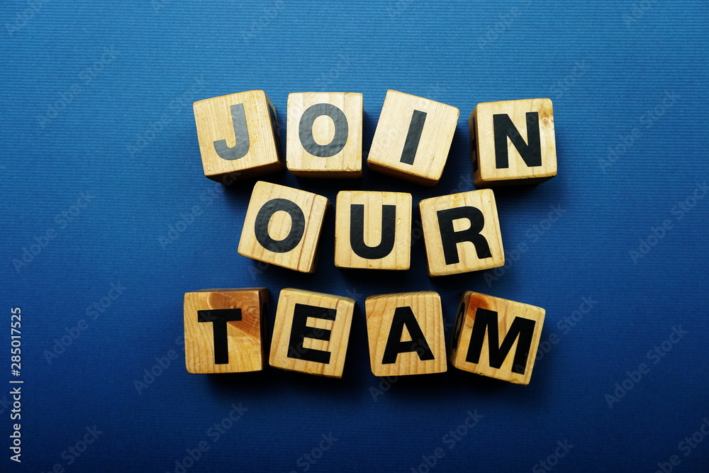 Obraz premium Top view Join our team alphabet letters on blue background