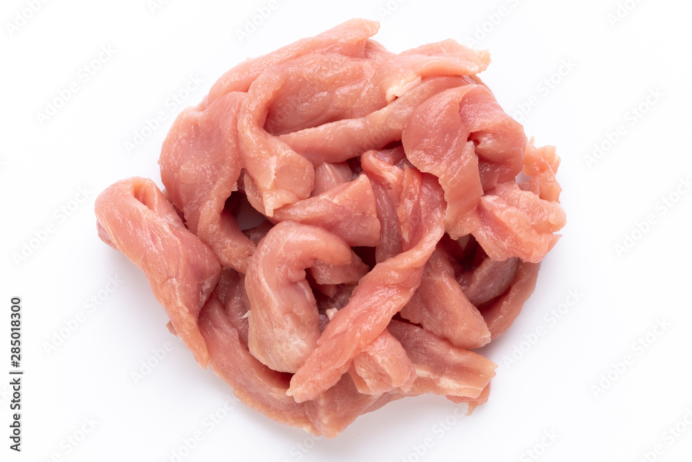Raw chicken fillet. Small pieces of meat isolated on white. Raw chicken fillet. Small pieces of meat isolated on white.