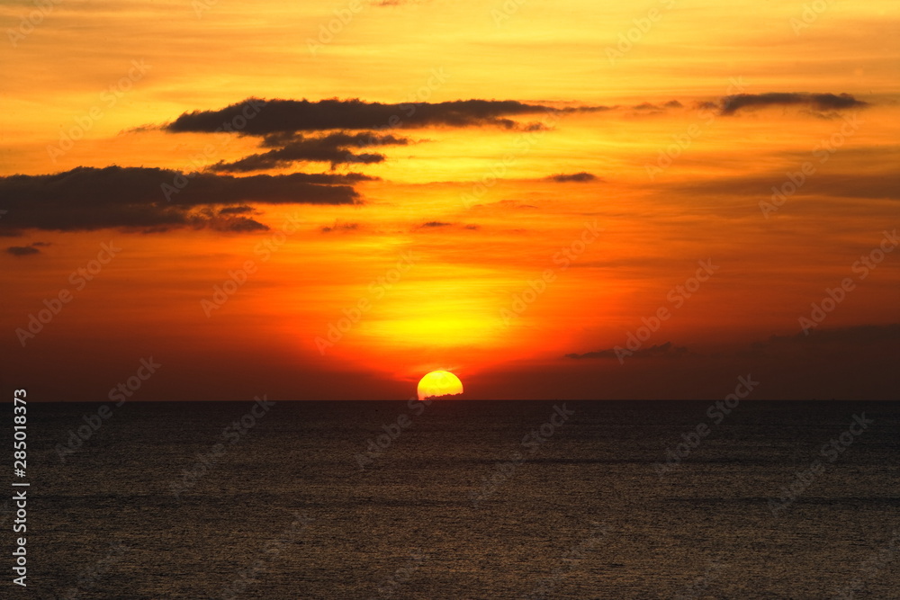 Sunset above the sea with beautiful sky
